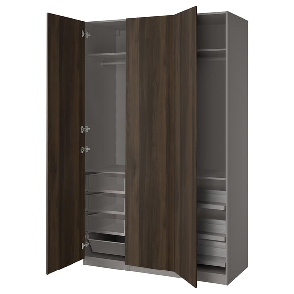 A PAX wardrobe in brown with adjustable shelves and drawers, offering versatile storage solutions.