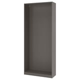 Depicts a grey PAX wardrobe frame, standing upright with a modern design, suitable for compact spaces.
