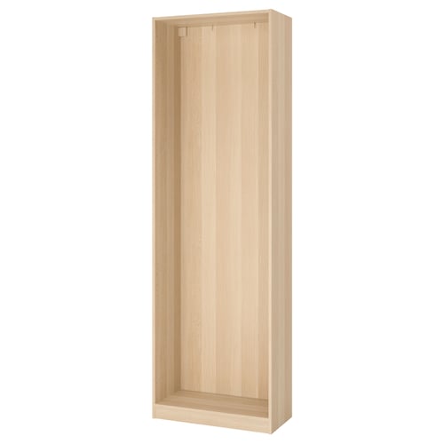 An ikea PAX wardrobe frame in white-stained oak. Its a tall, rectangular, foldable closet with a minimalist design, perfect for small spaces.