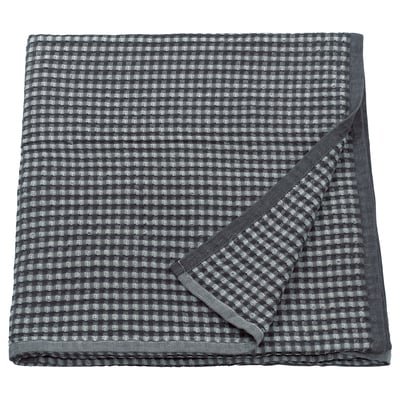 Grey chequered bedspread, reversible, 100% cotton, folded square.