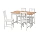 A white IKEA PINNTORP dining set with a wooden top table and four matching chairs. The set has a simple and fresh design, ideal for small spaces.