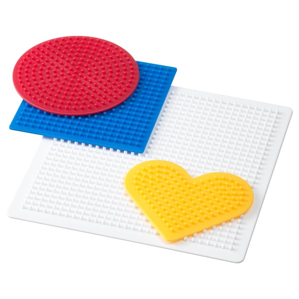 PYSSLA construction set with red circle, blue rectangle, and yellow heart shapes on white base.