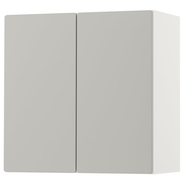A white SMÅSTAD wall cabinet with two closed doors. The cabinet is rectangular and made of recycled materials. It has a sleek, modern design.