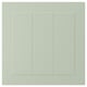 A STENSUND cabinet door in green with grooved panels and a smooth finish.