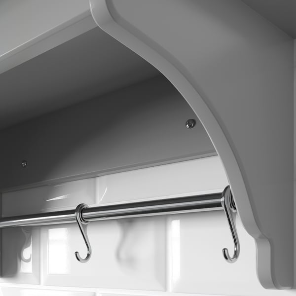 Modern wall shelf with hooks, made with high-quality materials.