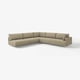 The UPPÅKRA sectional sofa is a tan-colored, modern, l-shaped design with large cushions and shiny legs.