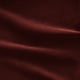 Luxurious deep red velvet sofa-bed, 10-year guarantee, thick foam mattress, removable washable cover.