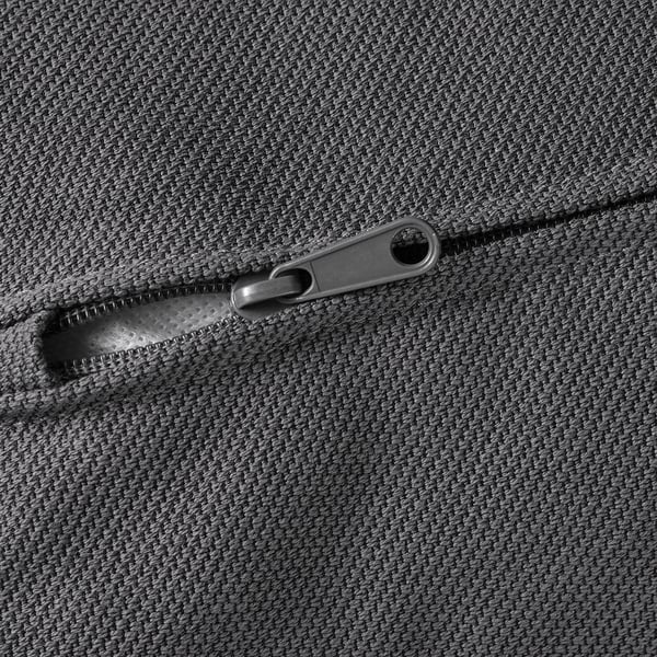 Close-up of high-quality zip on durable, textured fabric.