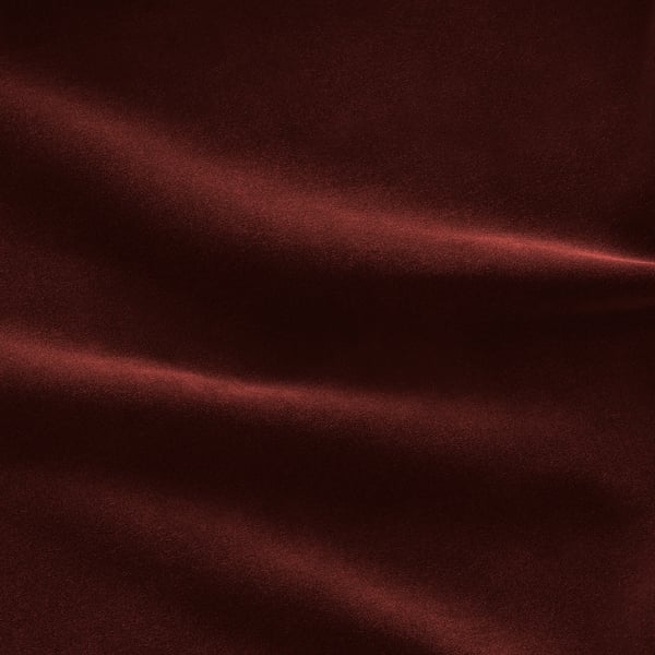 Rich red velvet texture, soft and plush, with subtle light reflection.