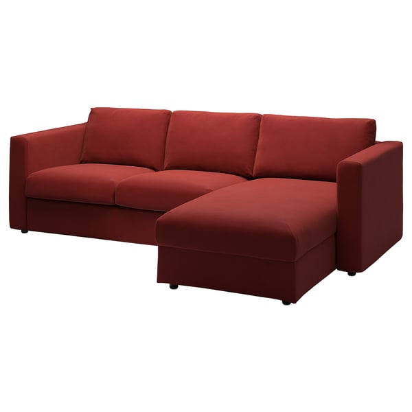 A red VIMLE sectional sofa with a chaise longue and plush seat cushions. Its modern, minimalist design is perfect for cosy living spaces.