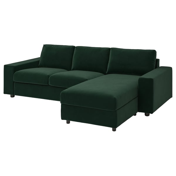 Dark green l-shaped sofa with storage chaise. Modern and comfy design, made of polyester and cotton.