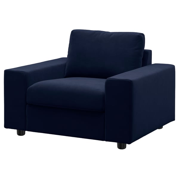 VIMLE armchair in blue. Velvet cover, boxy design with wide armrests.