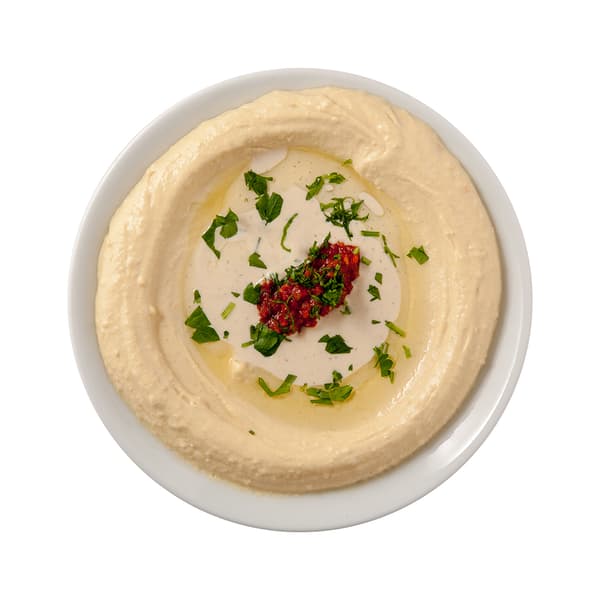 צלחת עם חומוס וקישוט פטרוזיליה