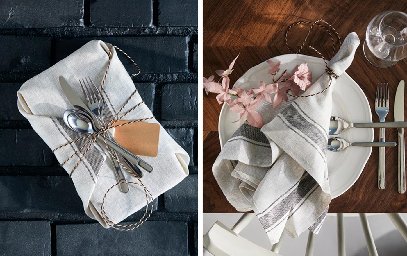 A basket wrapped as a gift in a tea towel beside a tea towel laying decoratively across a plate.