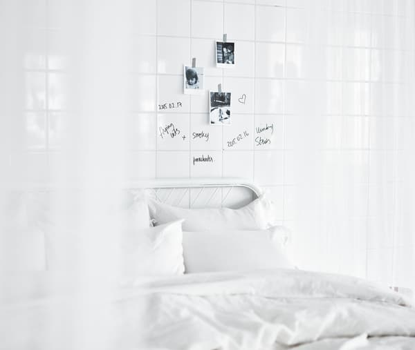 A big white bed, crisp sheets and pillows, draping textiles. What’s your dream bedroom