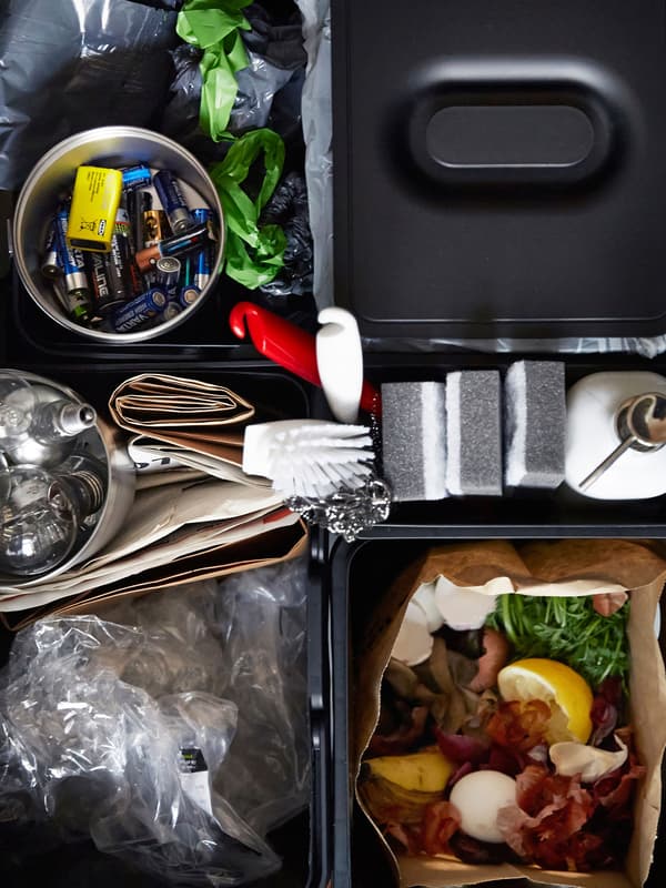 A bird’s-eye view of a waste sorting drawer, designed to make recycling simpler.