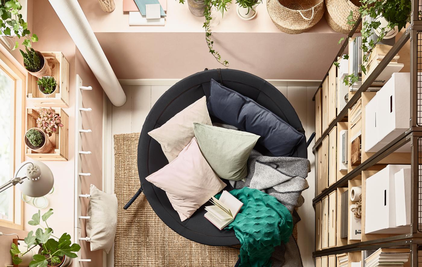A bird’s-eye view of the IKEA PS 2017 rocking chair filled with pillows.