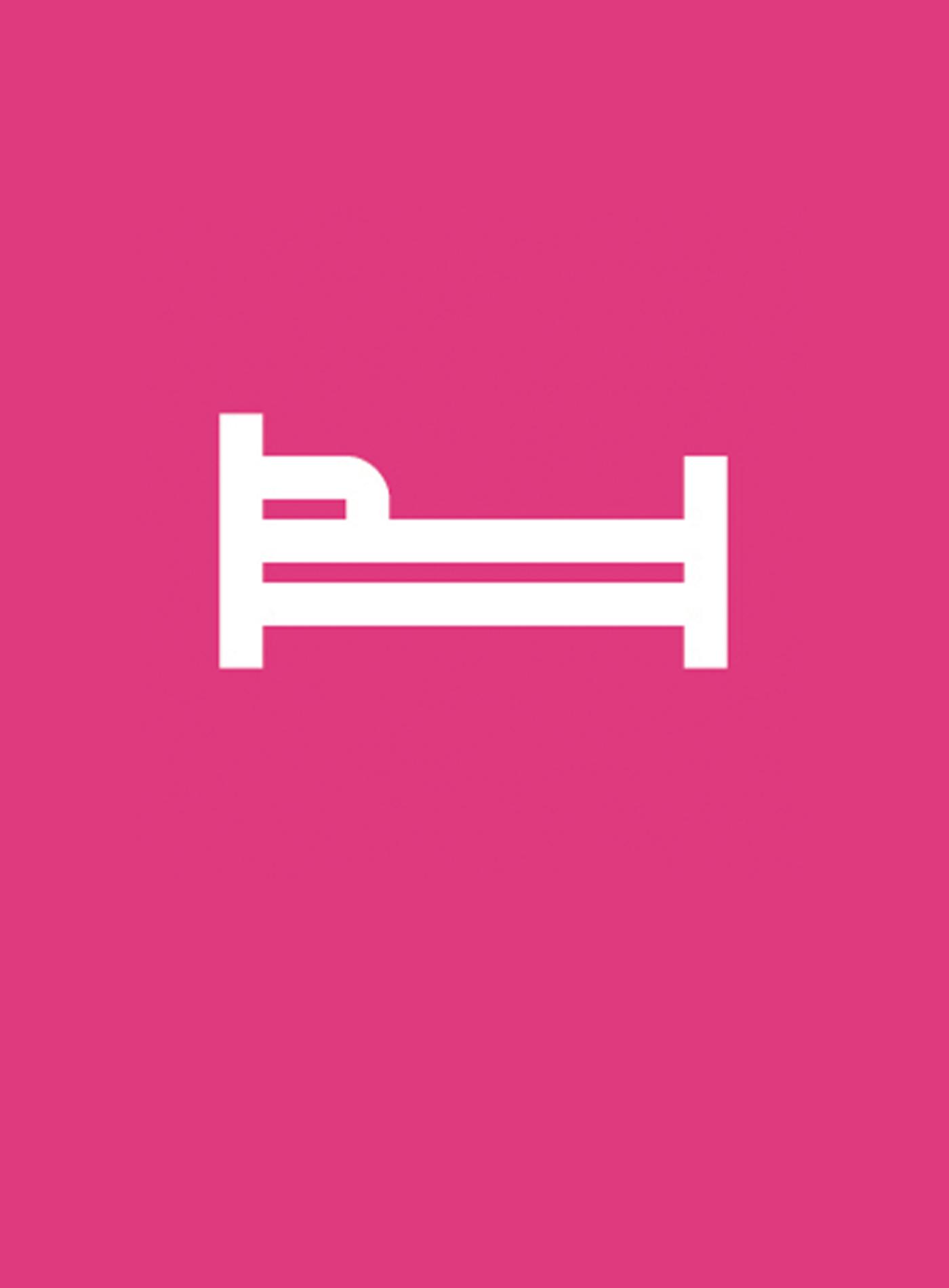 A black and white graphic symbol of a bed