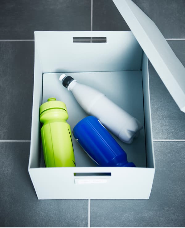A box filled with reusable water bottles.