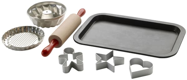 A children’s baking set with rolling pin, pastry cutters and baking tray.