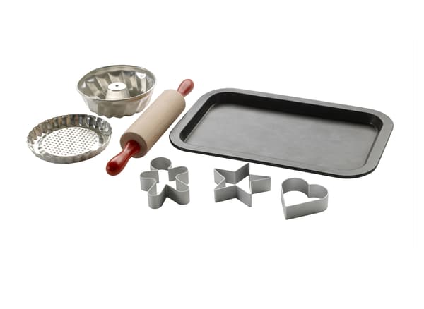A children’s baking set with rolling pin, pastry cutters and baking tray.