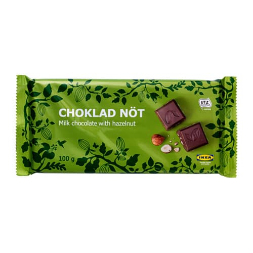 A CHOKLAD NÖT milk chocolate bar with hazelnut in a bright green plastic wrapper.