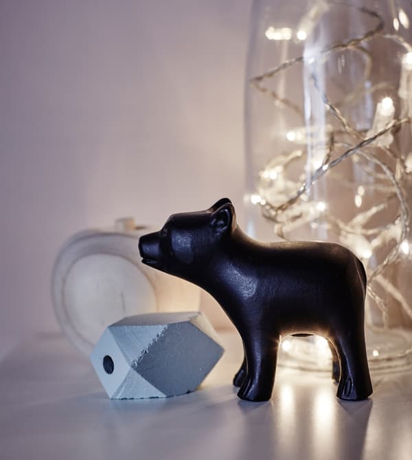 A close-up image of decorations on a side table.