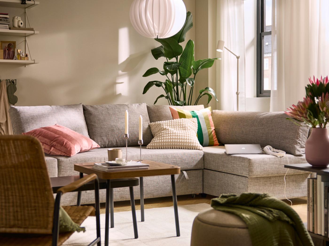 A complete living room with FRIHETEN sofa bed