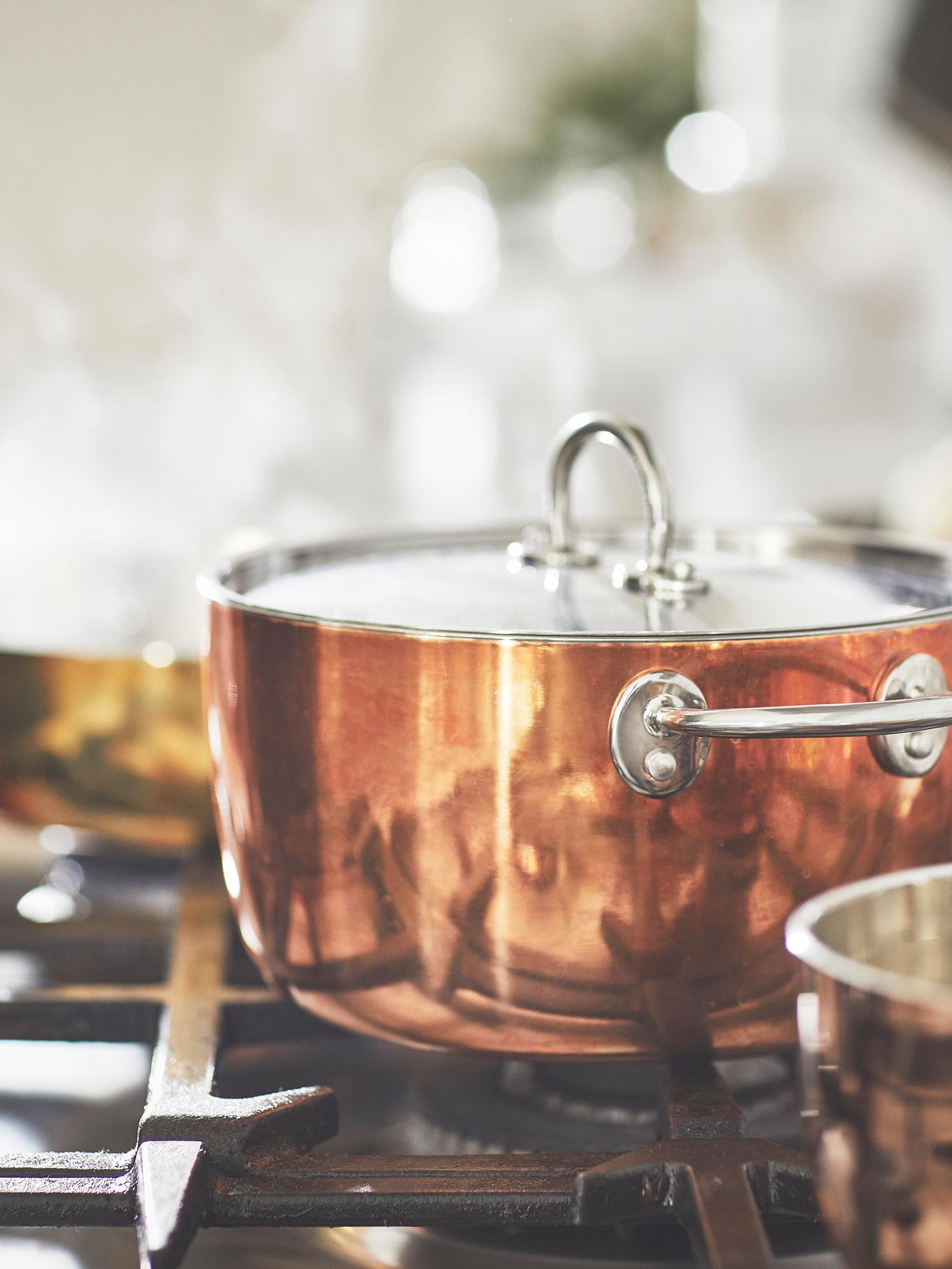 A copper/stainless steel FINMAT pot with lid