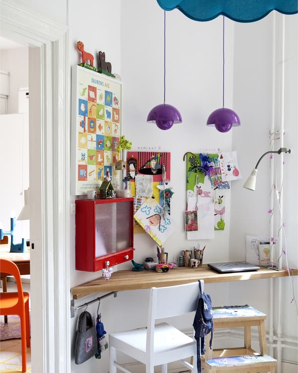 A custom-made, built-in children’s desk in a bedroom corner.