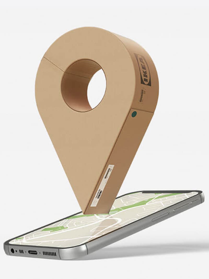 A digital map pin drop hovering over a mobile device.