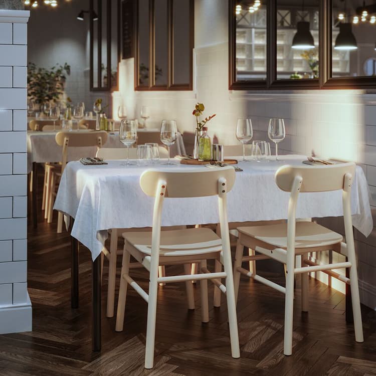 A dining table with white dining chairs