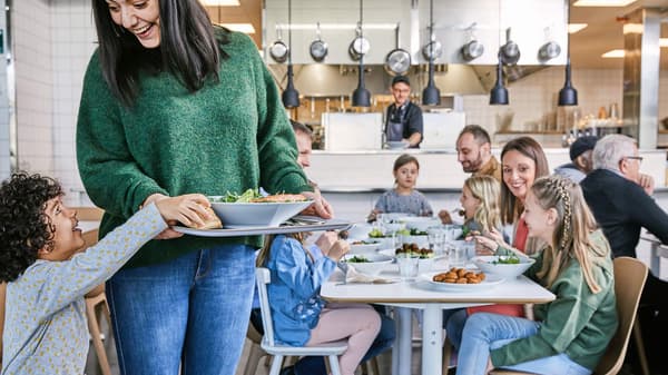 A family enjoying food at IKEA Restaurant.