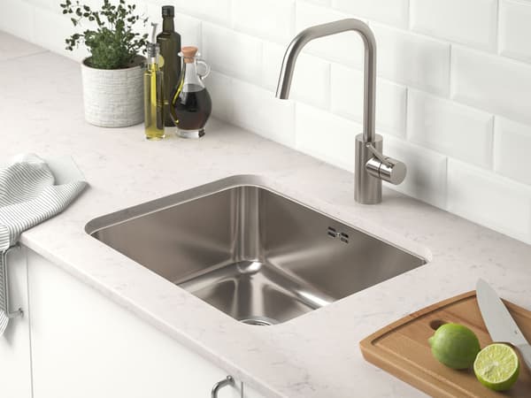 A flush-mounted sink in a kitchen
