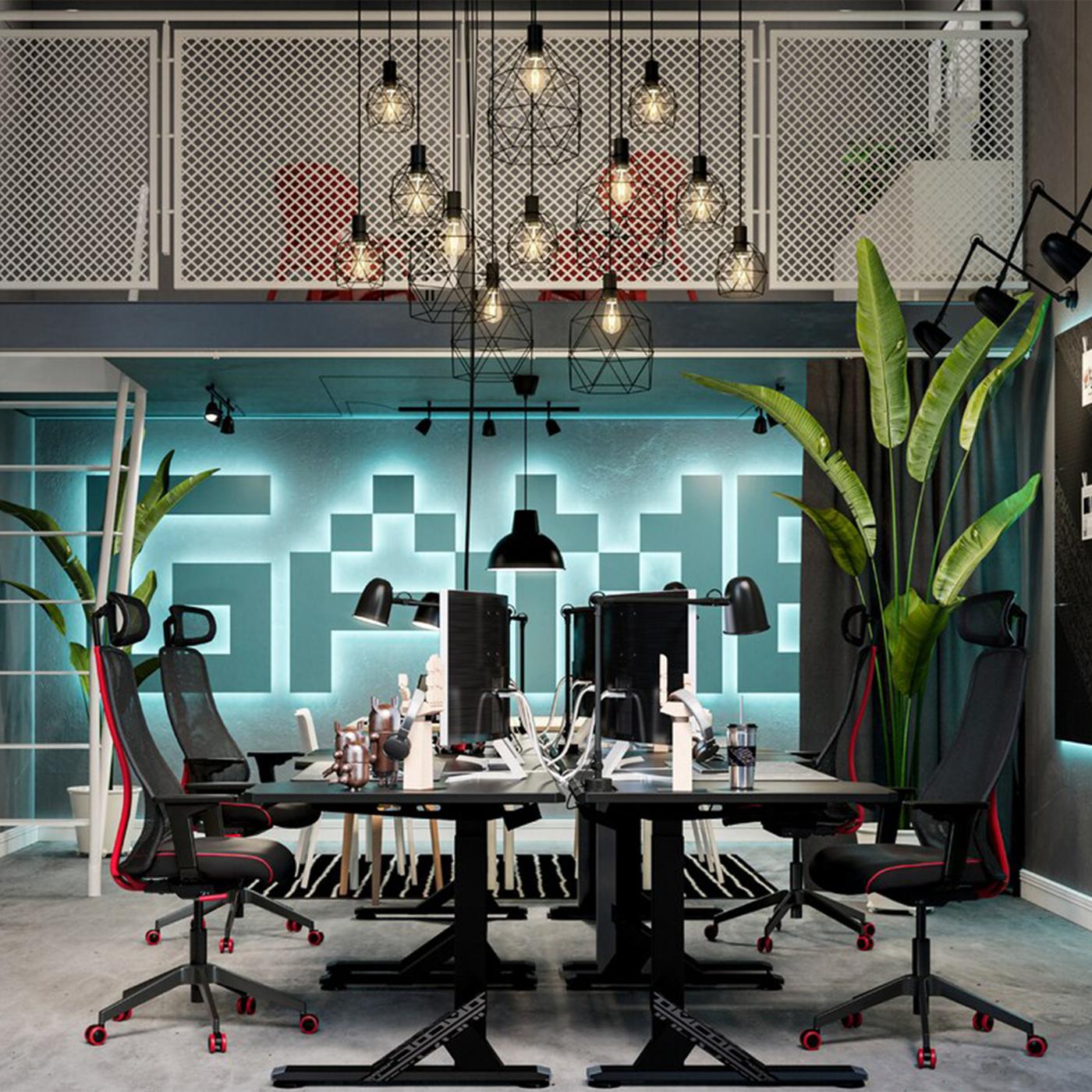 A futuristic room with a mezzanine balcony overlooking a collective workspace formed by UPPSPEL desks and MATCHSPEL chairs.