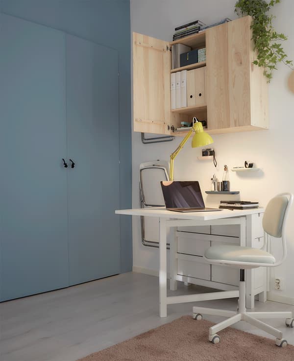 A gate leg table perfectly transitions from work space to dining space to hangout zone.