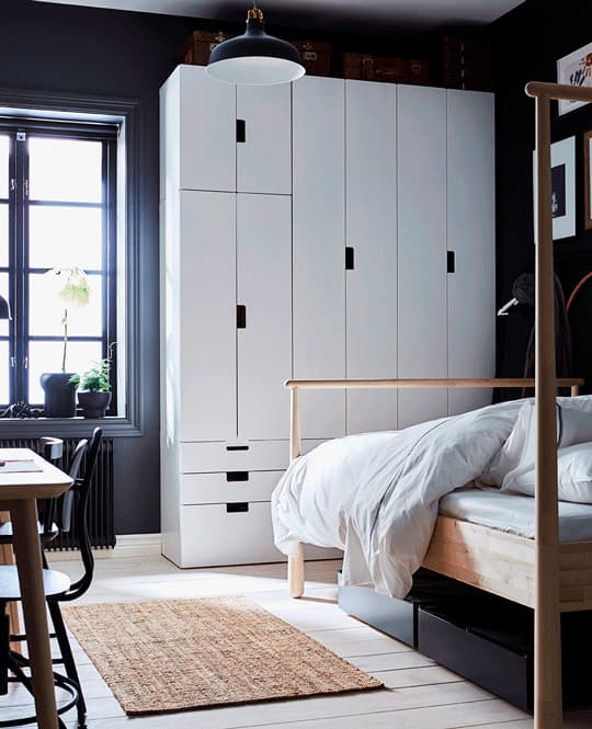 A GIF of wardrobe doors opening and closing to reveal separate storage for a child and a parent in a shared bedroom.