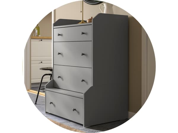 A gray HAUGA 4-drawer chest with a stool next to it.
