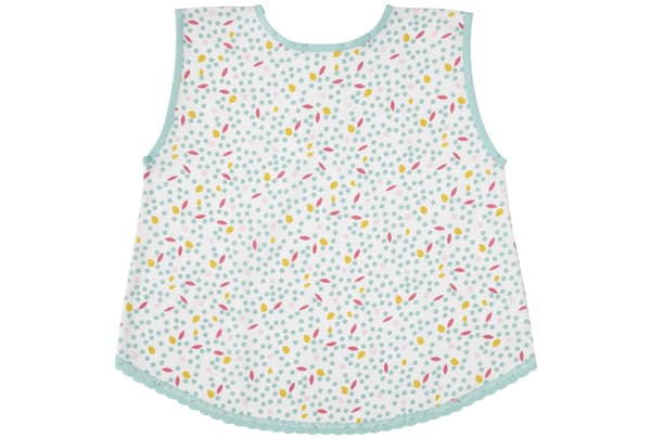 A green and white patterned child’s apron.
