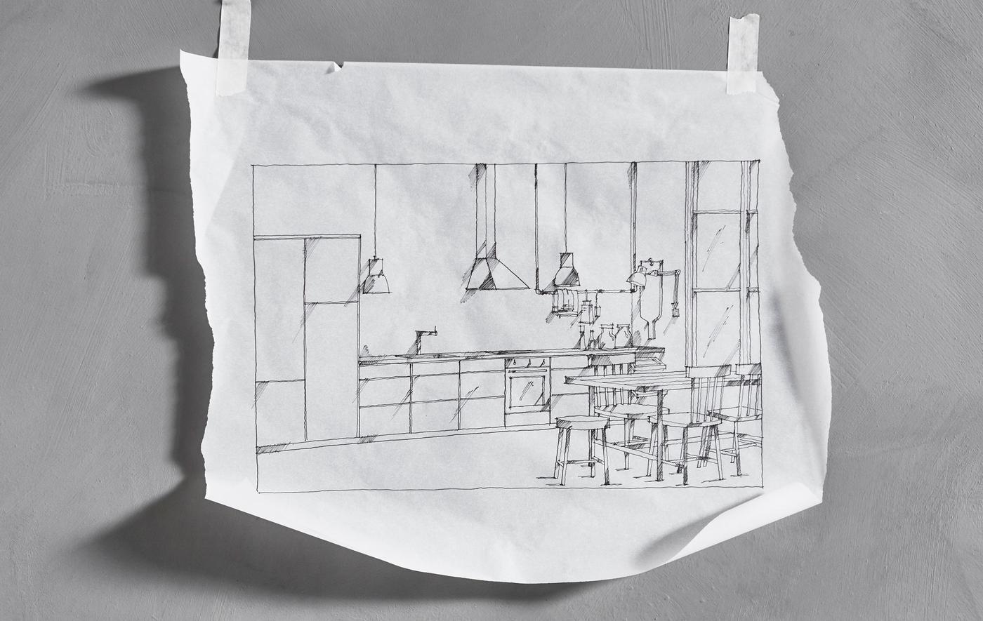 A hand-drawn sketch of a straight-line IKEA kitchen that’s taped to a wall 