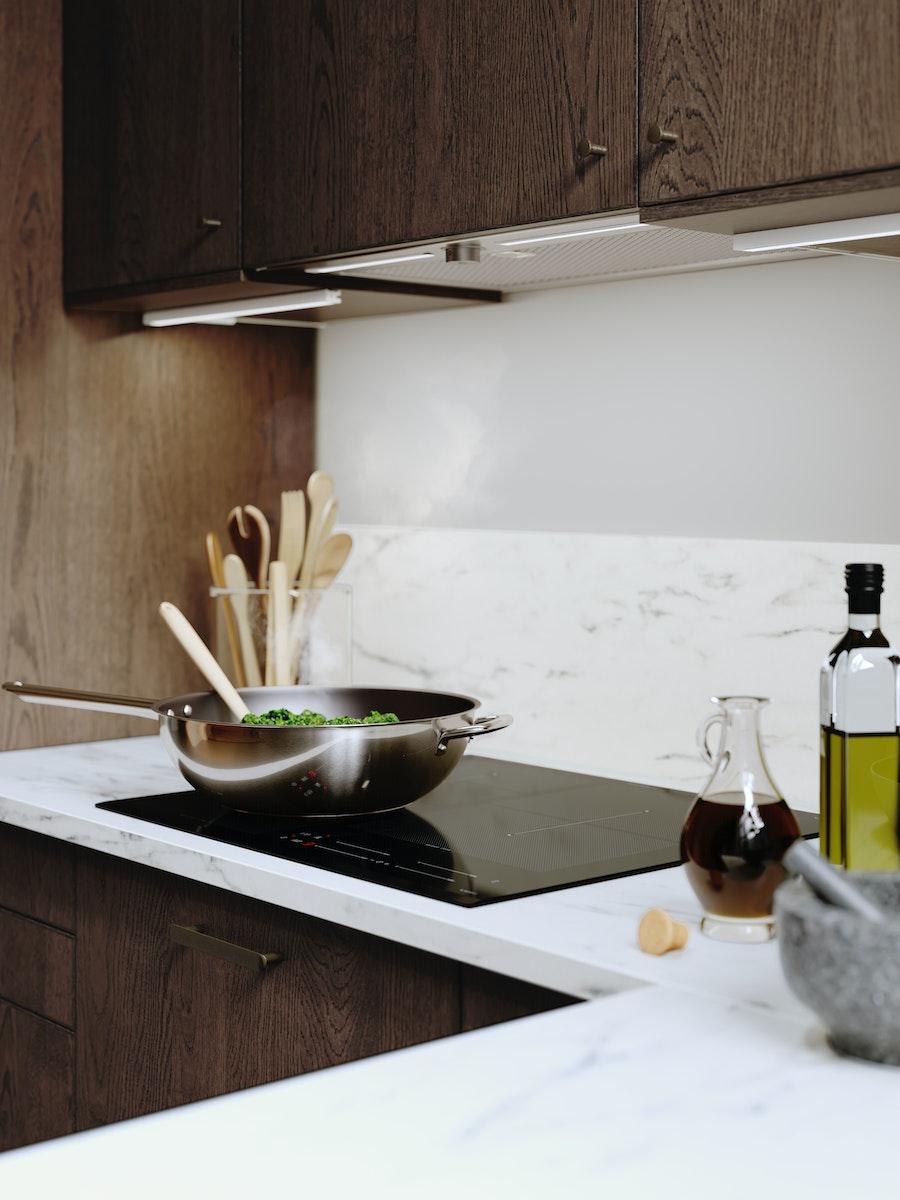 A kitchen corner with IKEA induction hob in focus. 