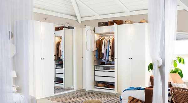 A light bedroom with a PAX wardrobe.