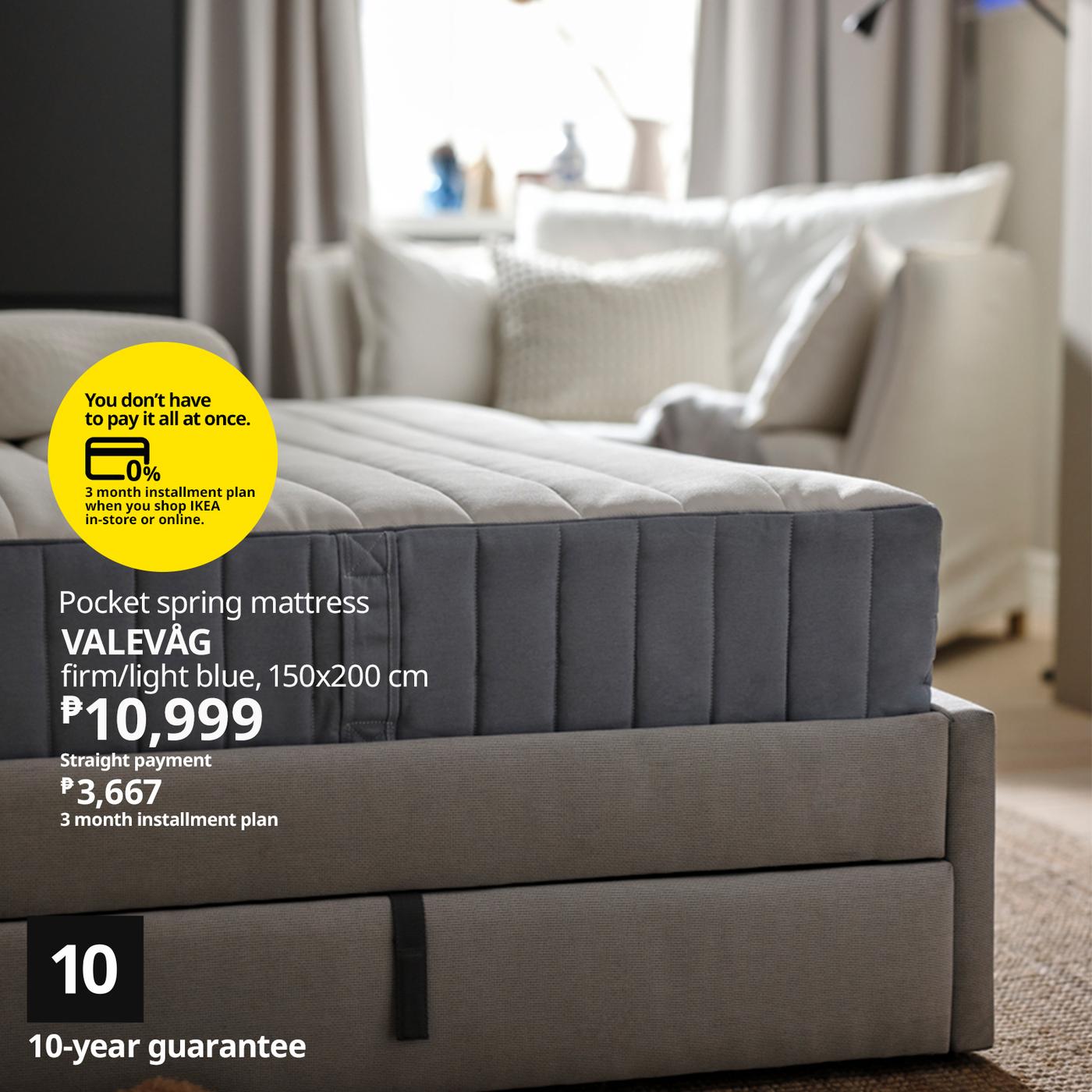 A light blue pocket spring mattress on a gray base, featuring modern design and a 10-year guarantee, priced at ₱10,999.