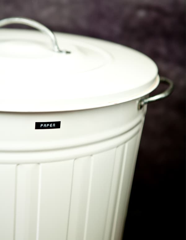 A line of neatly labelled white bins looks good and simplifies recycling.  