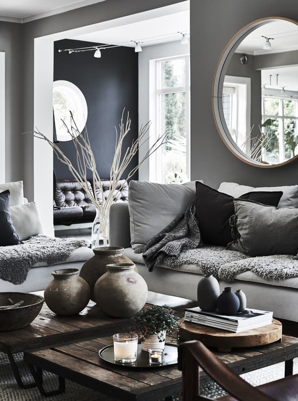 A living room decorated in neutral colours.