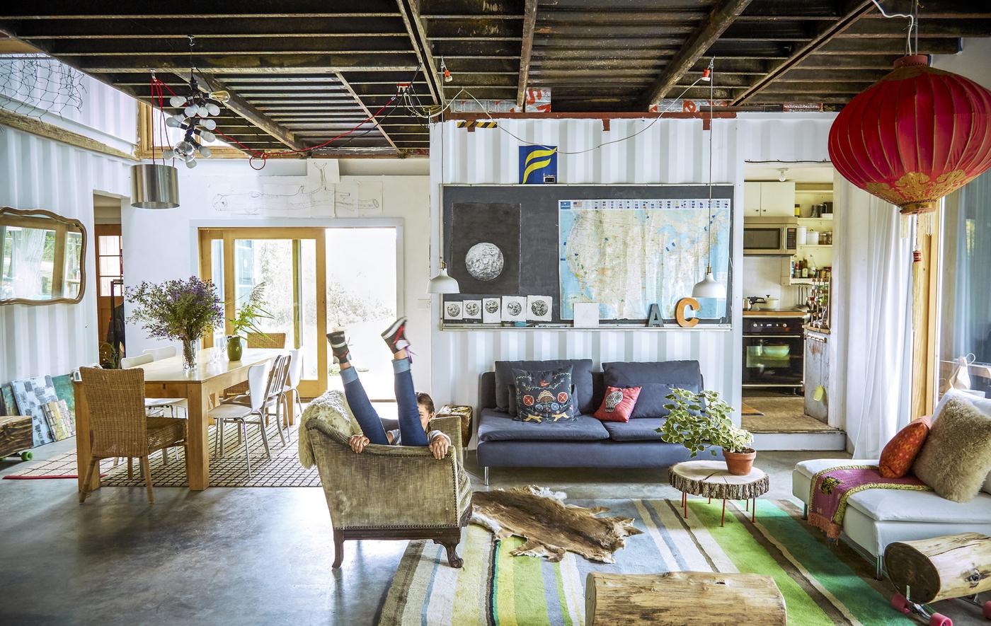 A living room inside a shipping container.