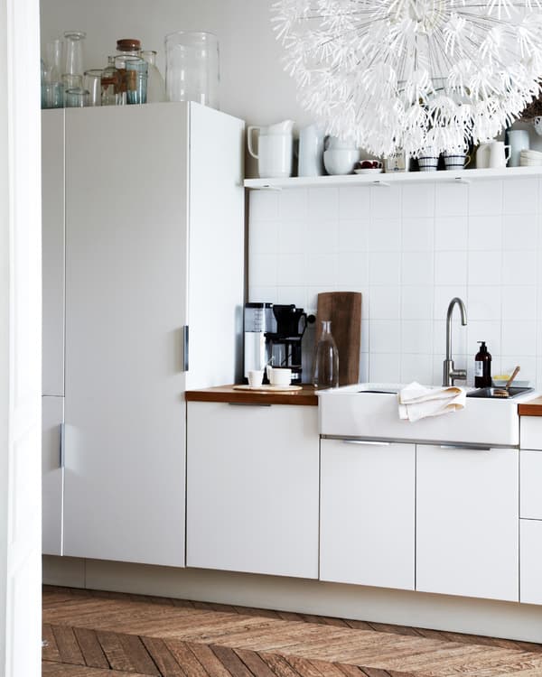 A mix of open and closed storage keeps the space light and packed with texture.