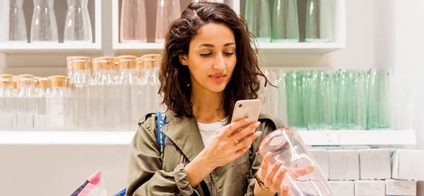 A person is scanning a product with the smartphone