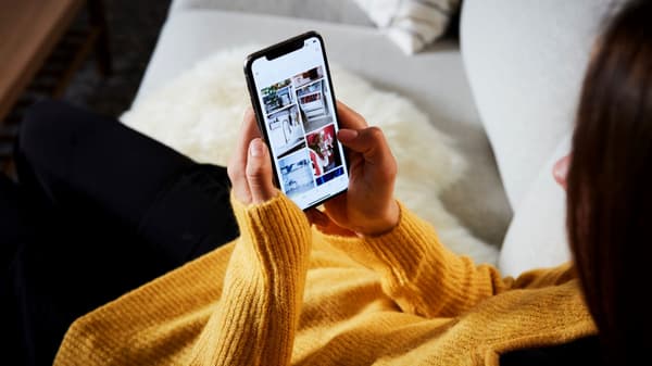 A person looking at IKEA products on their smartphone