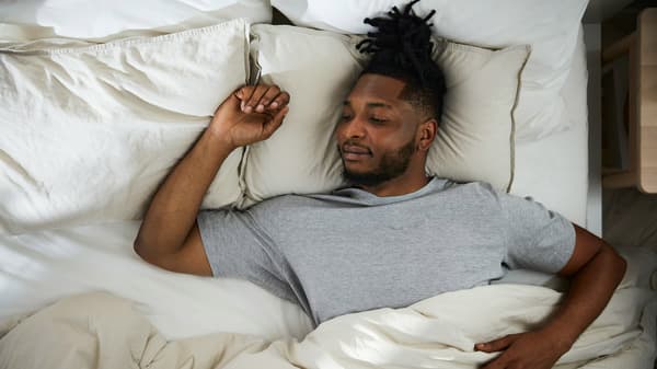a person sleeping on their back